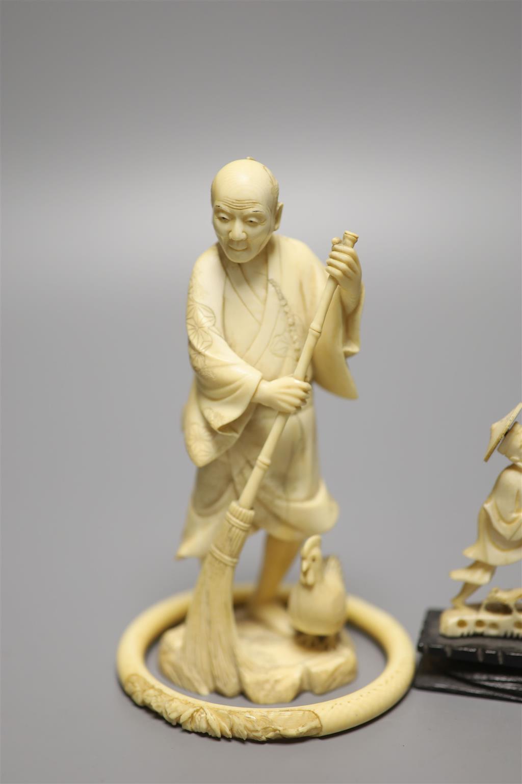 A Japanese carved ivory figure, male with brush, Meiji period, an elephant, a fisherman and a bangle